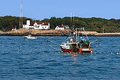 Fishing Trawler Approaches Eastern Point Light in Gloucester
